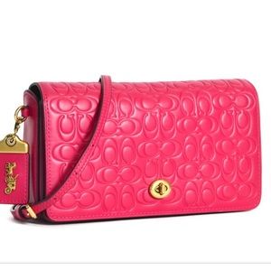 Coach signature dinky in magenta